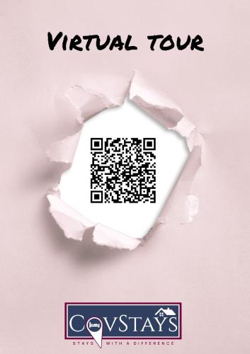 a piece of torn paper with a qr code at Victoria House - Deluxe Studios in Coventry City Centre, free parking, by COVSTAYS in Coventry