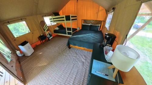 an aerial view of a bedroom in a tiny house at On The Lake #117 in Onalaska