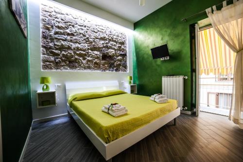 Postel nebo postele na pokoji v ubytování B&B da Rosario