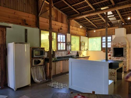 Dapur atau dapur kecil di Super Casa de Campo Portal do Espraiado