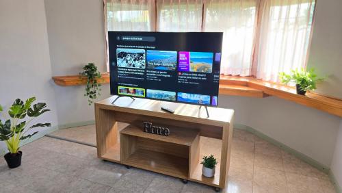 Et tv og/eller underholdning på Rincon de la Araucaria Dina Huapi