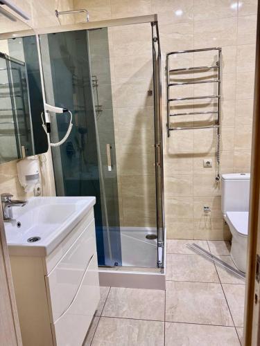 Koupelna v ubytování Spacious apartment by the sea