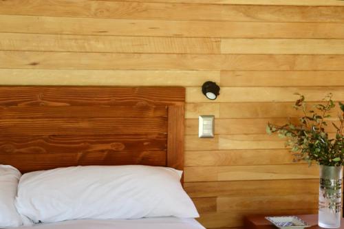 Postel nebo postele na pokoji v ubytování Claro de Luna Lodge