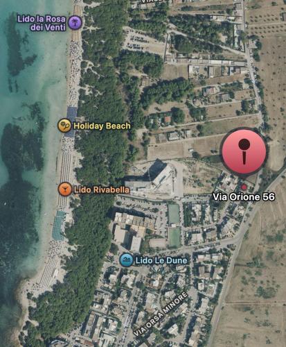 a map of a beach with a red circle at Orione 56 in Rivabella