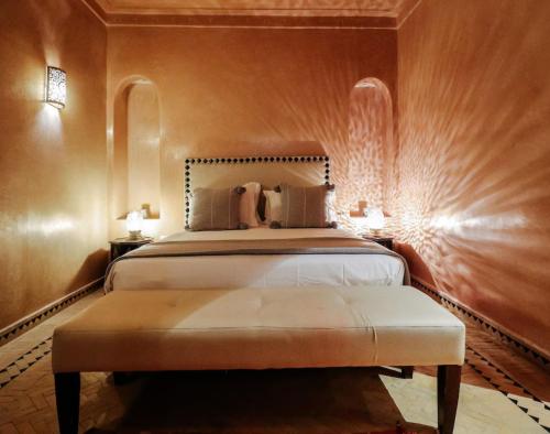 a bedroom with a large bed in a room at Villa Sophia in Azib Oulad Lâdem