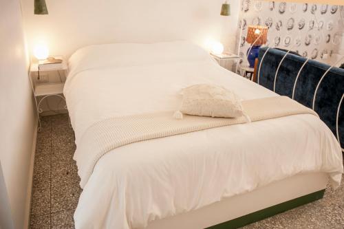 Letto o letti in una camera di Casa Solomare by Travel with Gianni