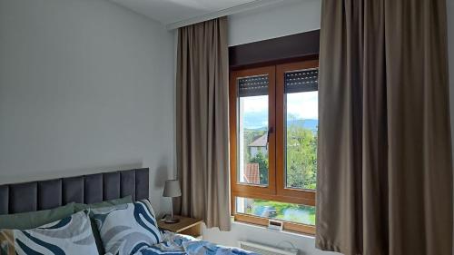 Postel nebo postele na pokoji v ubytování Apartman Barisic