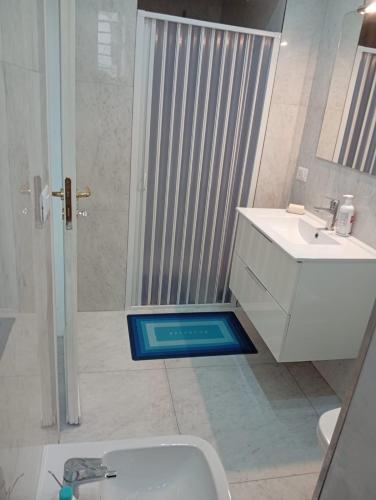 a bathroom with a shower and a toilet and a sink at Casa Maestrina in Benevento