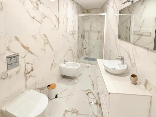 Et badeværelse på Nina da Nazare - BY SCH