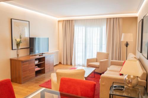 Televisyen dan/atau pusat hiburan di Aparto-Hotel Rosales