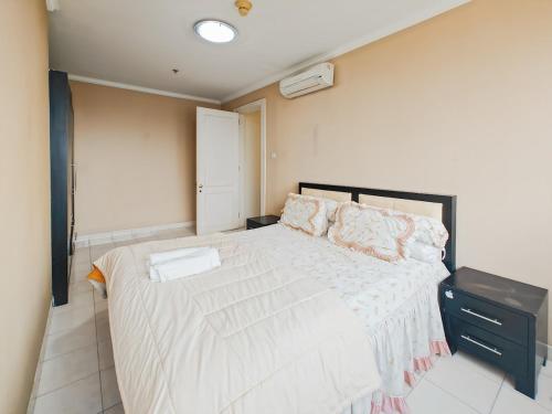 Large 2BR Ambassador 2 Apt with Pool Gym WiFi by 2ndHomeにあるベッド