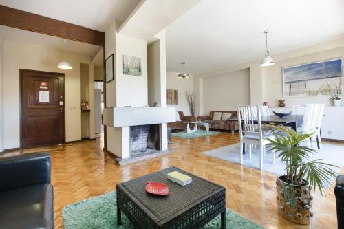 a living room with a couch and a fireplace at LV Premier Apartments Clerigos-RE2 in Porto