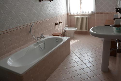 Koupelna v ubytování VILLA CARLA Affiliato Best-Incoming CIR-016235-CNI-00004