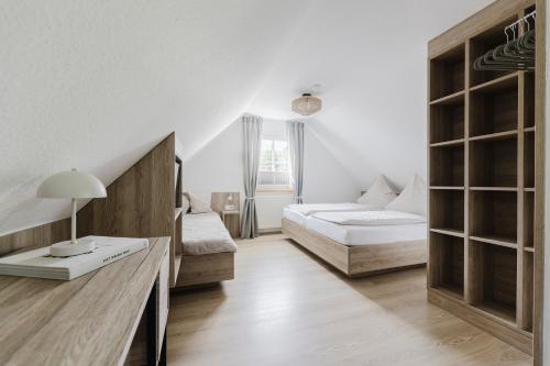 Katil atau katil-katil dalam bilik di FERIENHAUS WINKELMANN Landurlaub