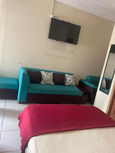 Ένα ή περισσότερα κρεβάτια σε δωμάτιο στο Hostal Terramar Salinas