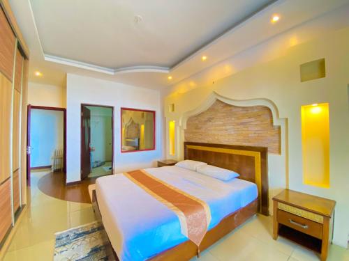 Ένα ή περισσότερα κρεβάτια σε δωμάτιο στο Shanzu Creek Beachfront Apartments