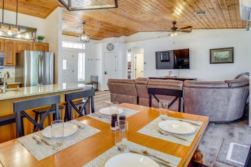 a dining room and kitchen with a table and chairs at Walk to City Park Family-Friendly Show Low Home in Show Low