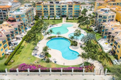 an aerial view of the pool at the resort at Eagle Beach-Best value-Island View 1BR condo-R362 in Palm-Eagle Beach