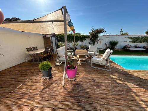 Photo de la galerie de l'établissement Maison avec piscine 3 étoiles proche de la plage, à Les Sables-dʼOlonne