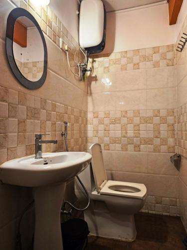 Ένα μπάνιο στο Hotel Golden Orchid