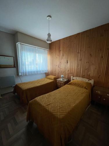 Postel nebo postele na pokoji v ubytování departamento céntrico Fenizzi