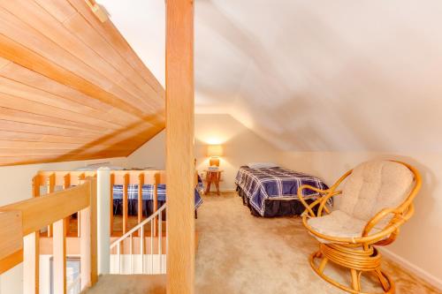 a attic room with a staircase and a bed at Charming Jackson Mountain Retreat on Golf Course! in Jackson