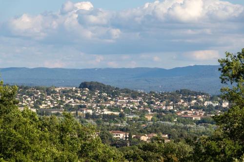 a view of a town in the hills at Terre Luberon in Pertuis