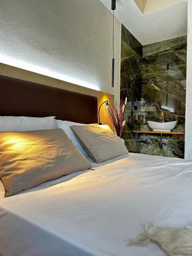 Postel nebo postele na pokoji v ubytování Umberto 28 Guest House
