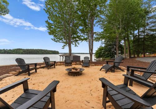 a group of chairs and a fire pit on the beach at Stone Point Overlook in Mooresville