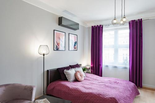 Posteľ alebo postele v izbe v ubytovaní Amber Apartments