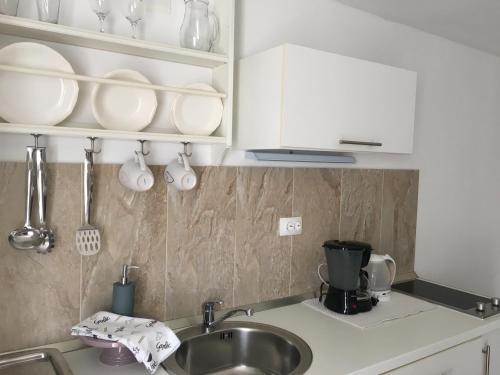 Kuchyň nebo kuchyňský kout v ubytování Casa di Lavanda
