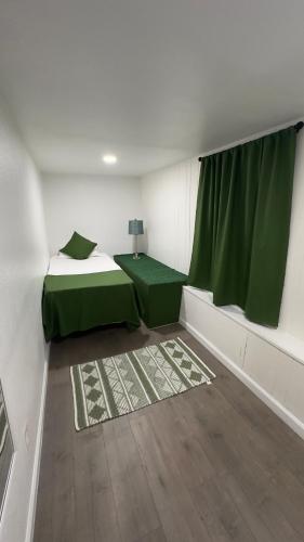 Katil atau katil-katil dalam bilik di Naryn Guest house