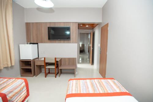 Katil atau katil-katil dalam bilik di Mato Grosso Palace Hotel