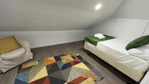 Katil atau katil-katil dalam bilik di Naryn Guest house