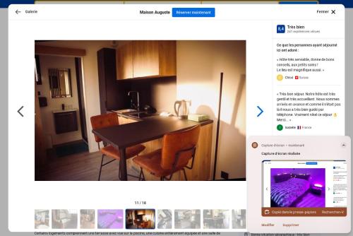 a screenshot of a kitchen with a table and chairs at Le Paradis d'Auguste in Meyzieu
