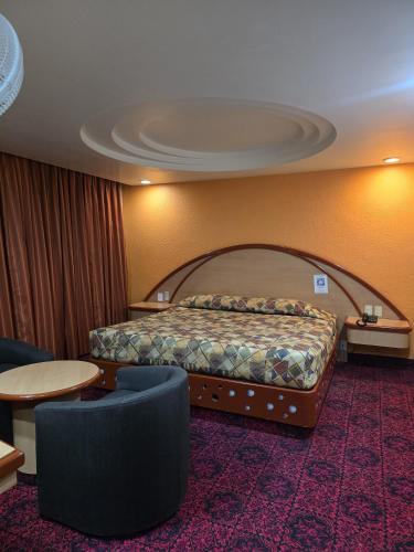 Postel nebo postele na pokoji v ubytování Hotel y Villas Gran Vía, Tultitlán