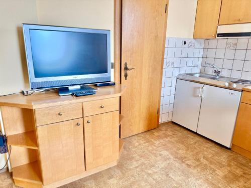 Una cocina o zona de cocina en Apartmenthotel Karawankenblick