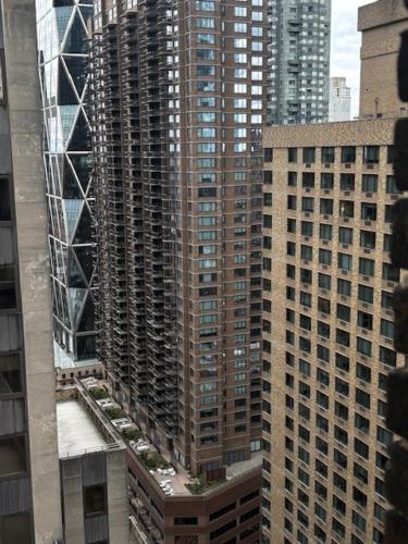 an aerial view of tall buildings in a city at The Manhattan Club in New York