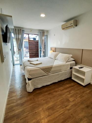 Una cama o camas en una habitación de Pousada Barbroch