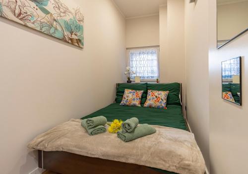 Postel nebo postele na pokoji v ubytování Podniebny Apartament