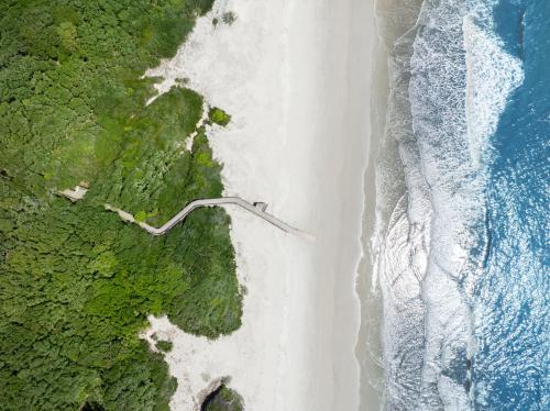 an overhead view of a beach and the ocean at Hampton Inn & Suites Jekyll Island in Jekyll Island