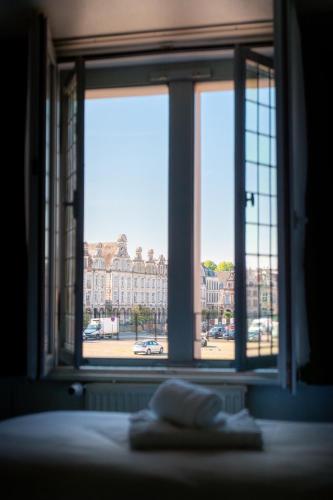 Hôtel Les Trois Lupparsにあるベッド