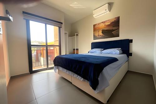 Postel nebo postele na pokoji v ubytování Cond. Riviera Premium