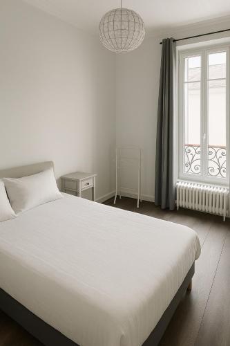 Photo de la galerie de l'établissement Le Nid Douillet en Plein Centre, à Levallois-Perret