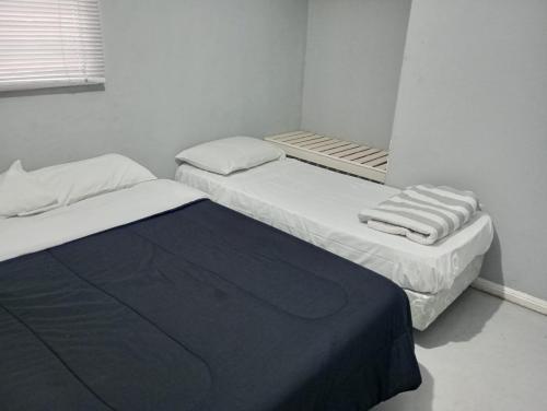Postel nebo postele na pokoji v ubytování Apart HOTEL RUTA 66