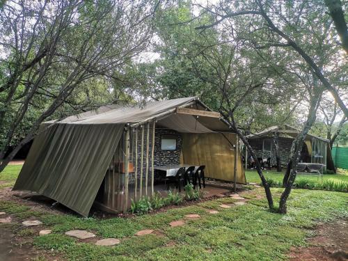 Сад в Hartbeespoort Cara-glamping self-cater units