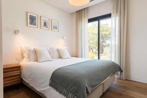 Ένα ή περισσότερα κρεβάτια σε δωμάτιο στο Casa Alquimia