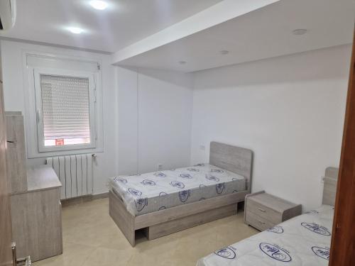 Postel nebo postele na pokoji v ubytování Villa Helios