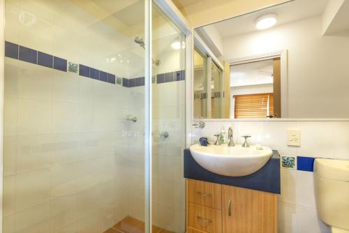 a bathroom with a sink and a shower at Riverview Apartment 2.6 3-5 Riverview Street in Iluka