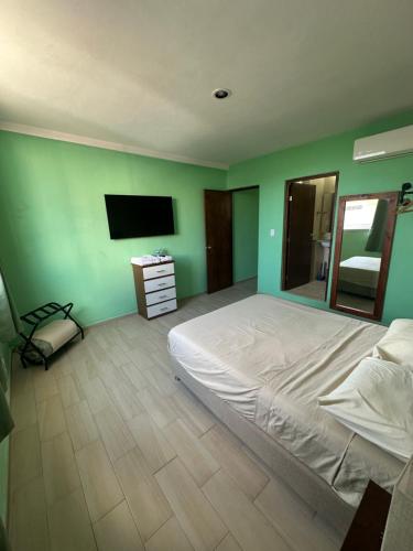 Ein Bett oder Betten in einem Zimmer der Unterkunft Puul Suites